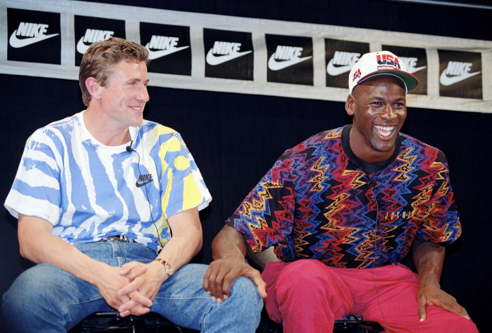 Michael Jordan, right, sits with Ukrainian track and field athlete Sergey Bubka, during a news conference for Nike in Barcelona, Spain, on July 25, 1992. (AP Photo/Eric Risberg)