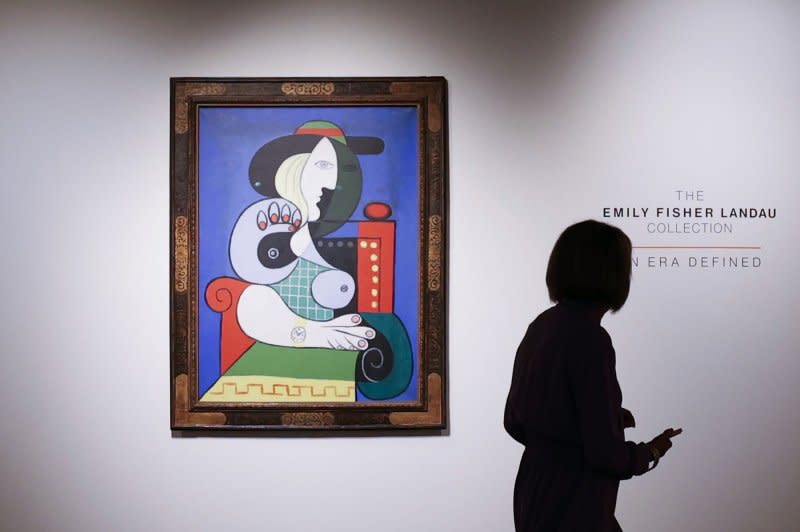 Pablo Picasso painted Femme à la montre in 1932, soon after the end of the secrecy around his affair with Marie-Thérèse Walter, his "golden muse" depicted in the work. Photo by John Angelillo/UPI