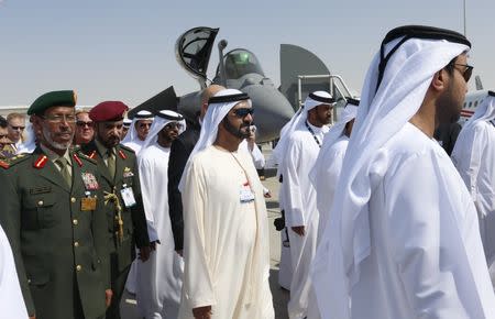 United Arab Emirates Vice President, Prime Minister and Dubai ruler Sheikh Mohammed bin Rashid al-Maktoum (C) tours the Dubai Airshow November 8, 2015. REUTERS/Ahmed Jadallah