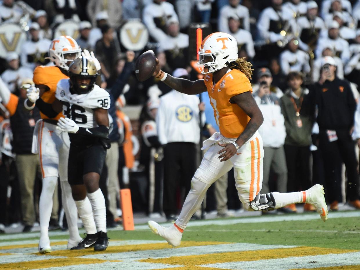 Tennessee quarterback Joe Milton III (7) runs in a touchdown during an NCAA college football game against Vanderbilt on Saturday, November 25, 2023 in Knoxville, Tenn.