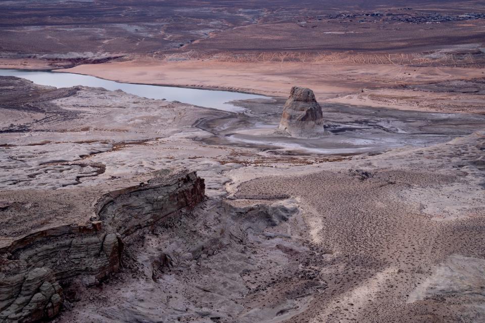 Lone Rock in Lake Powell's Wahweap Bay on the Arizona/Utah border as seen on Feb. 1, 2022. Lake Powell was at 26% of capacity, 168 feet below its full elevation of 3,700 feet above sea level.