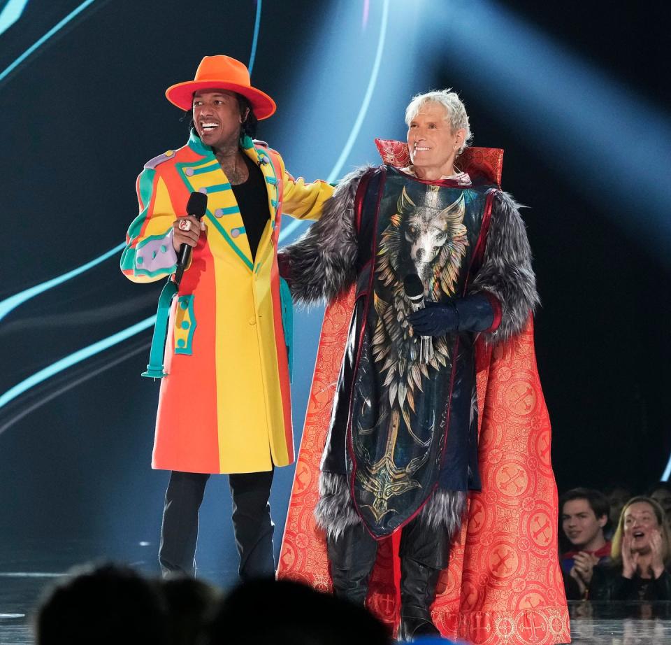 the masked singer, dc superheroes night, host nick cannon and michael bolton as wolf march 2023