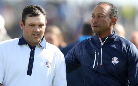 Patrick Reed with Tiger Woods - Credit: PA