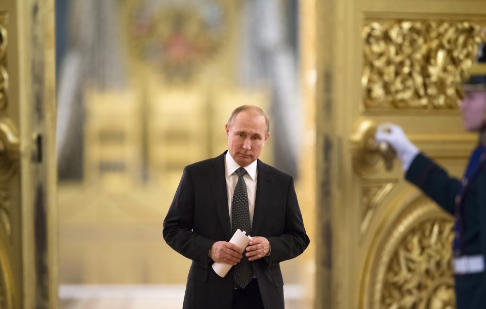 FILE In this file photo taken on Thursday, April 5, 2018, Russian President Vladimir Putin enters a hall to chair a meeting of the State Council in the Kremlin in Moscow, Russia. U.S. and European sanctions have restricted Russia’s access to international capital markets, limited imports of Western energy and military technologies and spooked international investors. (AP Photo/Alexander Zemlianichenko, Pool, File)