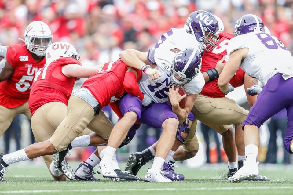 <span class="caption">Games are set to resume this October.</span> <span class="attribution"><a class="link " href="https://www.gettyimages.com/detail/news-photo/northwestern-quarterback-hunter-johnson-is-sacked-during-a-news-photo/1171804610?adppopup=true" rel="nofollow noopener" target="_blank" data-ylk="slk:Lawrence Iles/Icon Sportswire via Getty Images;elm:context_link;itc:0;sec:content-canvas">Lawrence Iles/Icon Sportswire via Getty Images</a></span>