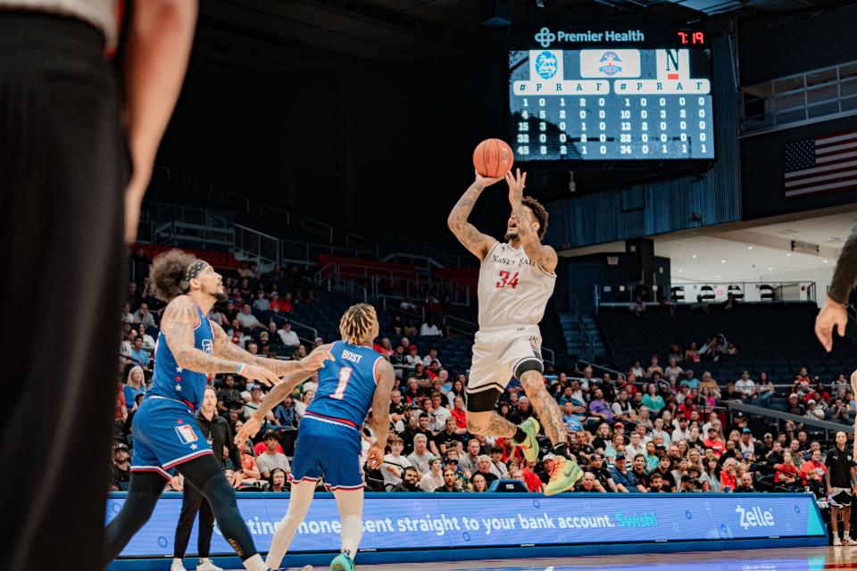 Jarron Cumberland hangs in the air for a shot against Friday Beers in TBT play at UD Arena Monday, July 31. Nasty 'Nati fell in the quarterfinal 72-66.