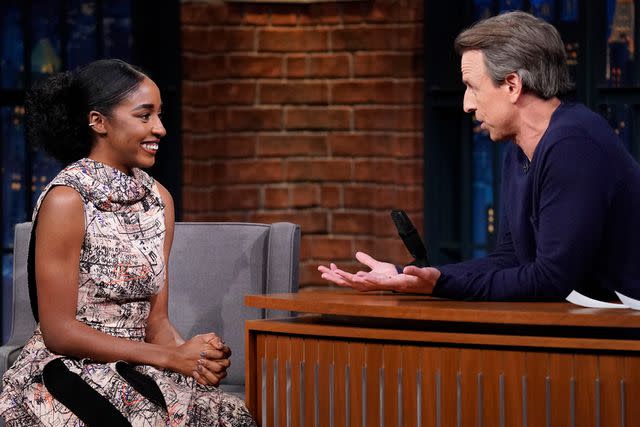 <p>Lloyd Bishop/NBC via Getty</p> Ayo Edebiri (left) and Seth Meyers on <em>Late Night with Seth Meyers</em>