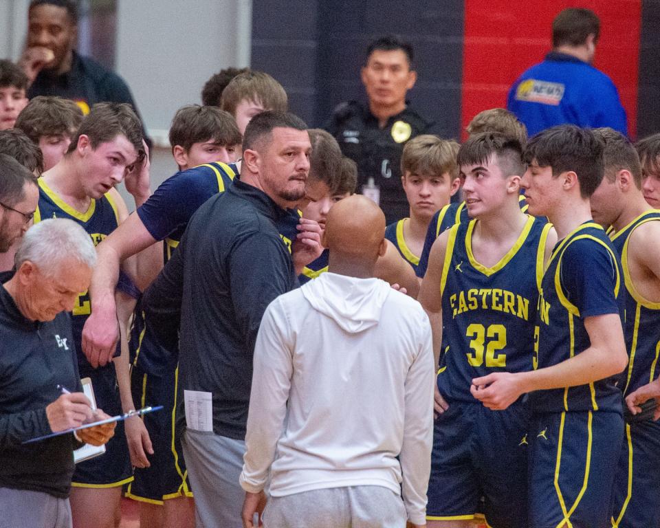 Eastern York coach Justin Seitz brings his players together during a timeout on Friday. Allentown Central Catholic defeated Eastern York in the PIAA Class 4A boys' quarterfinals on Friday, March 17, 2023.
