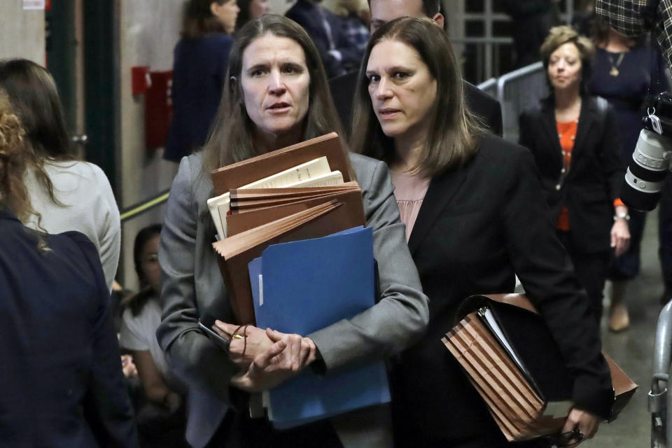 Assistant District Attorneys Meghan Hast, left, and Joan Illuzzi leave the Harvey Weinstein rape trial during the lunch break, Thursday, Jan. 23, 2020, in New York. (AP Photo/Richard Drew)