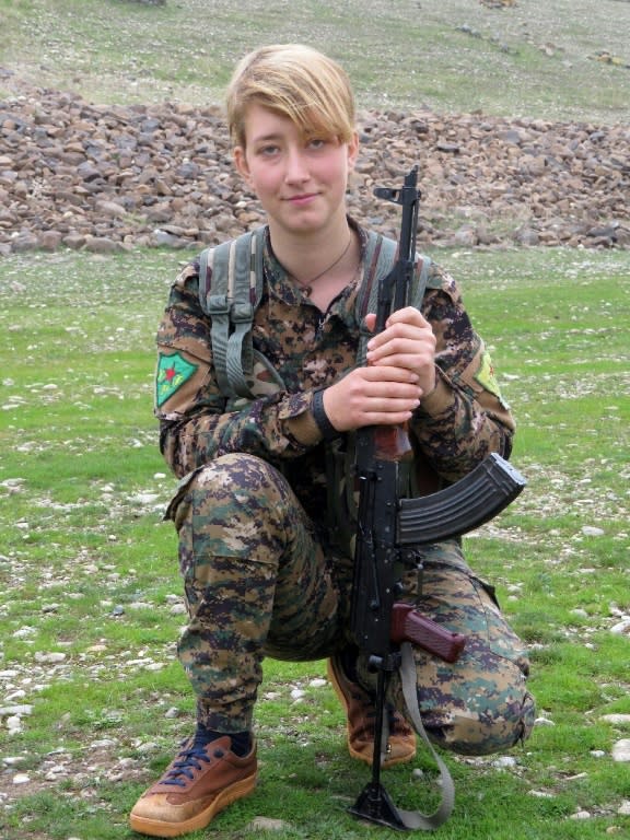 A picture made available by the Women's Protection Units (YPJ) Press office on March 19, 2018, shows British YPJ fighter Anna Campbell posing for a picture at an undisclosed location