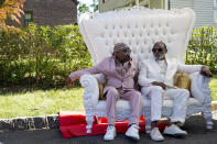 Ron Isley, right, and Ernie Isley pose for a photo during a street renaming ceremony, Thursday, June 24, 2021, in Englewood , N.J. Two New Jersey towns have renamed streets in honor of the Isley Brothers, the legendary R&B group that behind songs such as, "Shout," "Twist and Shout" and "It's Your Thing." Ron Isley and Ernie Isley attended separate ceremonies Thursday in Teaneck and Englewood, neighboring towns outside New York City where they lived during the band's heyday in the 1960s. (AP Photo/Mary Altaffer)