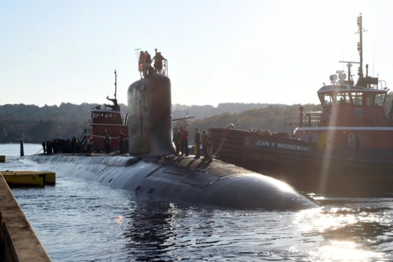 The future USS Hyman G. Rickover (SSN 795) prepares to moor for the first time at Naval Submarine Base New London in Groton, Connecticut on October 3. (U.S. Navy photo by Chief Petty Officer Joshua Karsten)