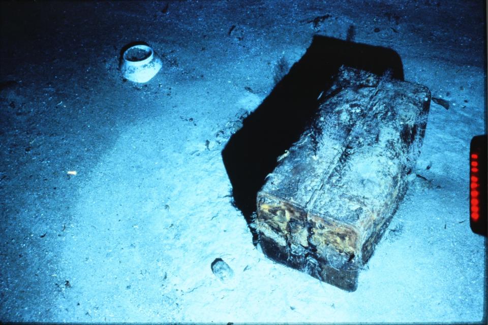 In this photo provided by the California Gold Marketing Group is the trunk belonging to S.S. Central America passengers Ansel and Adeline Easton that was discovered on the Atlantic Ocean seabed in 1990. Riches entombed in the wreckage of the pre-Civil War steamship for more than a century will begin to hit the auction block for the first time Dec. 3, 2022, when more than 300 Gold Rush-era artifacts are offered for public sale in Reno, Nev. (California Gold Marketing Group via AP)