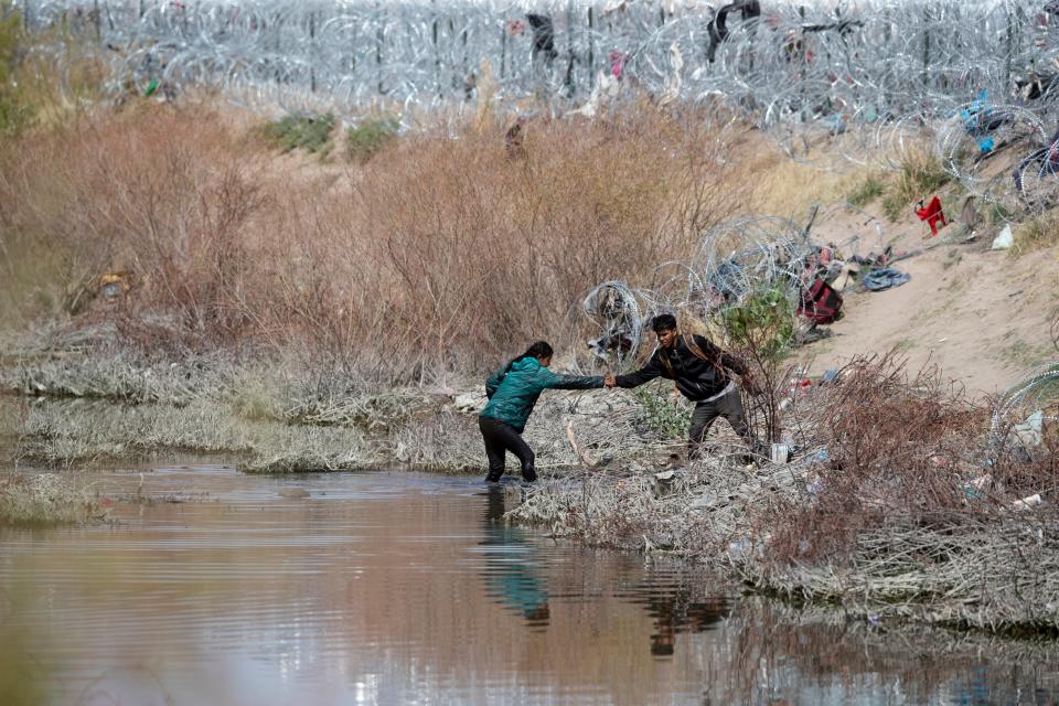 Migrant cross the Rio Grande as they make an attempt to turn themselves in to Border Patrol on March 6, 2024.