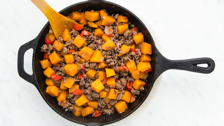 Butternut squash and ground beef in skillet