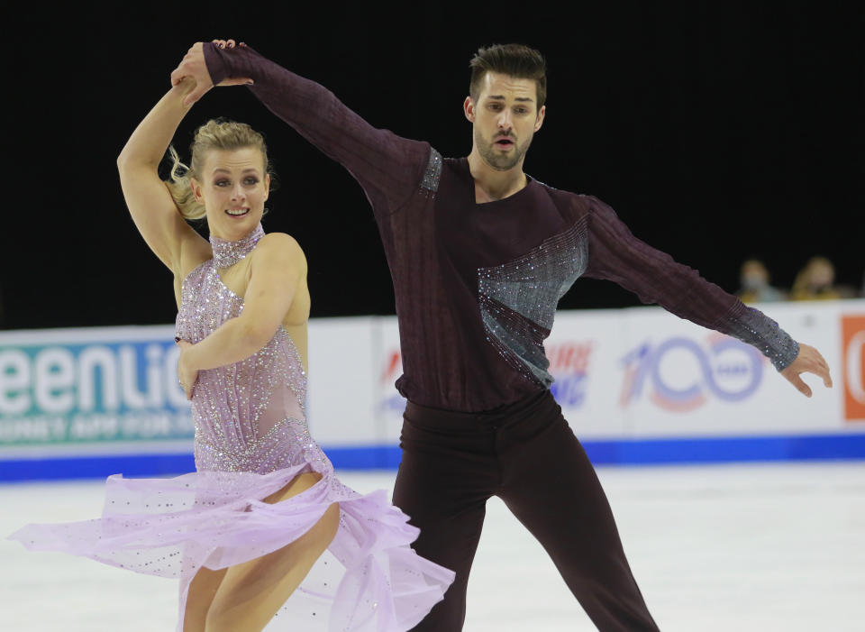 Madison Hubbell and Zachary Donohue perform in the free dance at the Skate America figure skating event Sunday, Oct. 24, 2021, in Las Vegas. (AP Photo/Ronda Churchill)