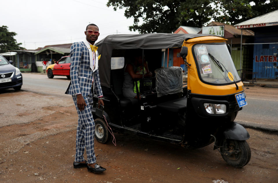 A pastor as he is about to be transported to church in Kumasi, in the Ashanti region, Ghana. (Photo: Siphiwe Sibeko/Reuters)