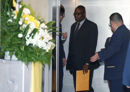 Visitors arrive at Singapore Casket, the funeral parlour where the body of the late former president of Zimbabwe Robert Mugabe is being held in Singapore