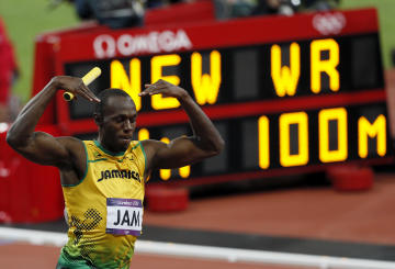 Jamaica's Usain Bolt celebrates winning the men's 4x100m relay final (REUTERS) 