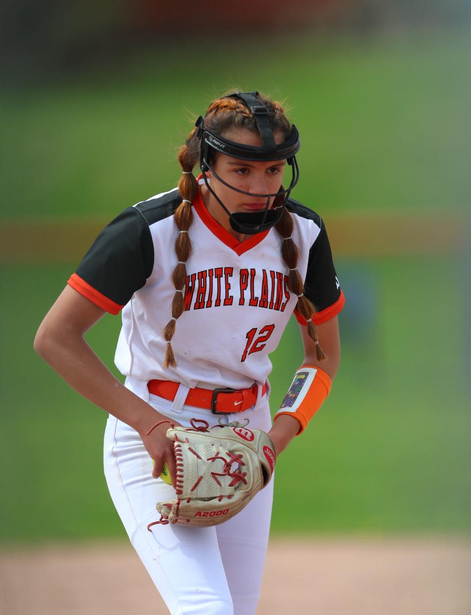 White Plains pitcher Serena Gillen (12) delivers a pitch during their 1-0 10-inning win over Ursuline. White Plains defeats Ursuline 1-0 in softball action at White Plains High School  in White Plains on Saturday, April 16, 2022.
