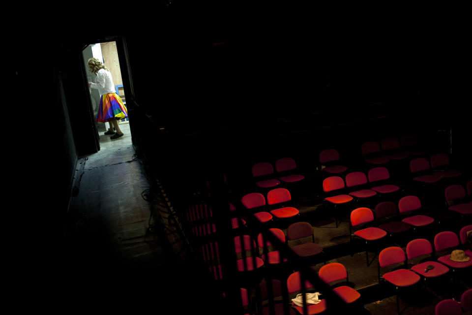 In this photo taken on Tuesday, June 18, 2013, Israeli Orthodox Jew Shahar Hadar gets dressed as he prepares for a show at a drag queen school in downtown Tel Aviv, Israel. Hadar, a telemarketer by day, has taken the gay Orthodox struggle from the synagogue to the stage, beginning to perform as one of Israel’s few religious drag queens. His drag persona is that of a rebbetzin, a female rabbinic advisor, a wholesome guise that stands out among the sarcastic and raunchy cast of characters on Israel’s drag queen circuit. (AP Photo/Oded Balilty)