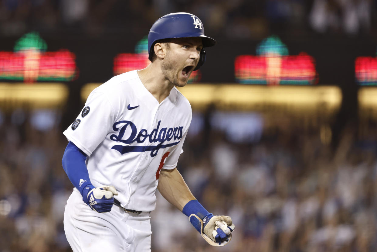 LOS ANGELES, CALIFORNIA - OCTOBER 01: Trea Turner #6 of the Los Angeles Dodgers celebrates as he rounds the bases after hitting a grand slam against the Milwaukee Brewers during the fifth inning at Dodger Stadium on October 01, 2021 in Los Angeles, California. (Photo by Michael Owens/Getty Images)