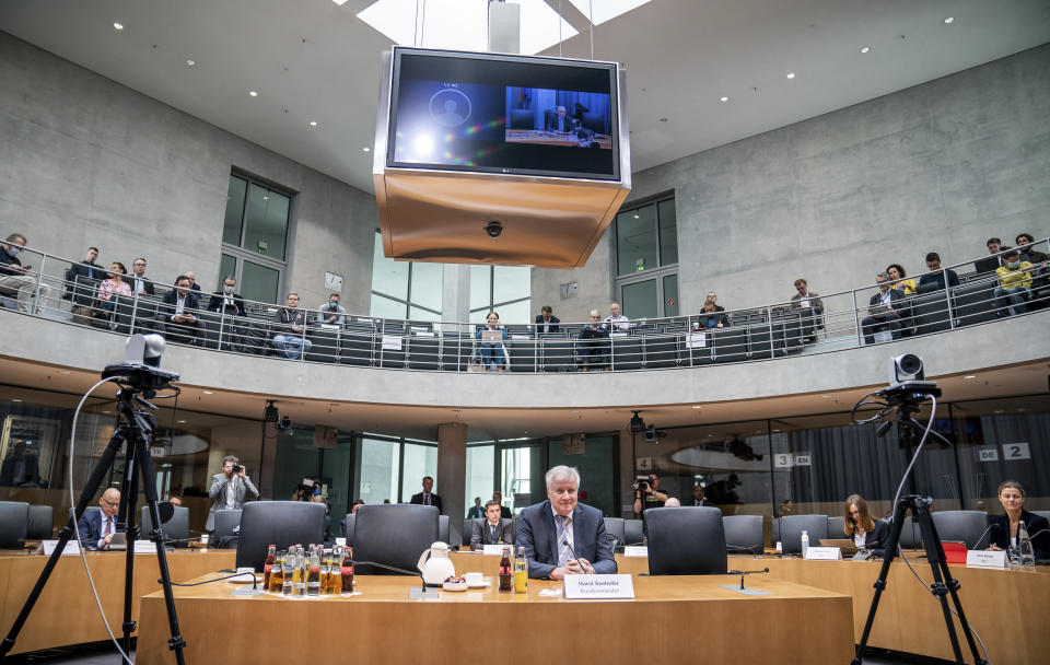 Federal Minister of the Interior for Building and Homeland Affairs, Horst Seehofer, waits to be questioned as a witness in the Bundestag's Toll Inquiry Committee. The committee of inquiry is looking into the circumstances surrounding the failure of the car toll after it was found that the toll was not in conformity with European law. (Michael Kappeler/dpa via AP)