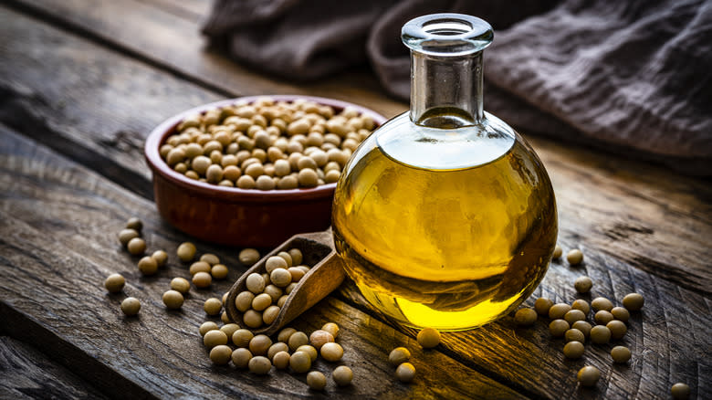 Bottle of oil with soybeans