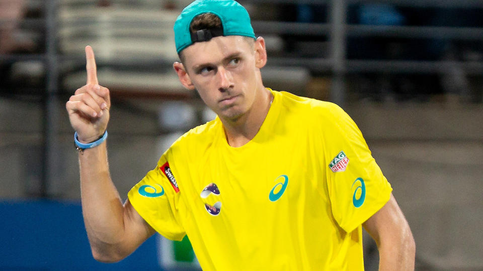 Alex De Minaur, pictured here in action against Rafael Nadal at the ATP Cup.