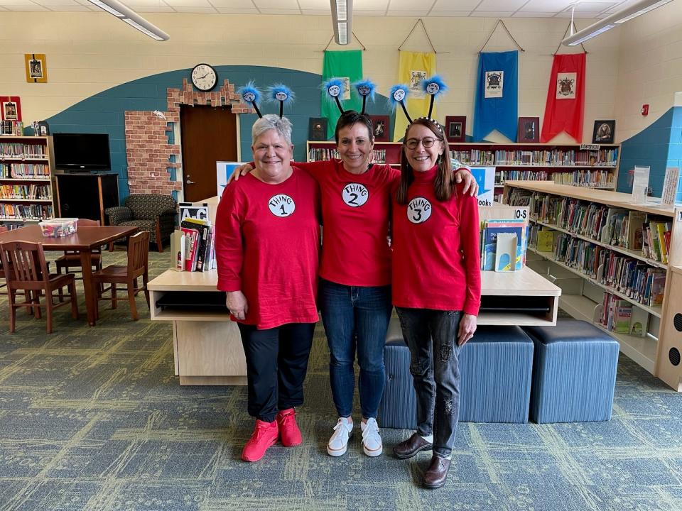 Former Bataan Memorial Teachers Jane Taylor, Diane Rosiar, and Patty Soderberg visited Bataan Memorial Primary grade 1 as Thing 1, 2, and 3 for a Dr. Seuss lesson.