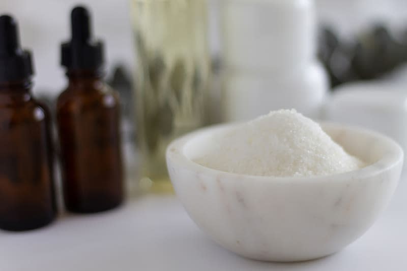 Marble Bowl of Epsom Bath Salts with Spa Bottles and Jars