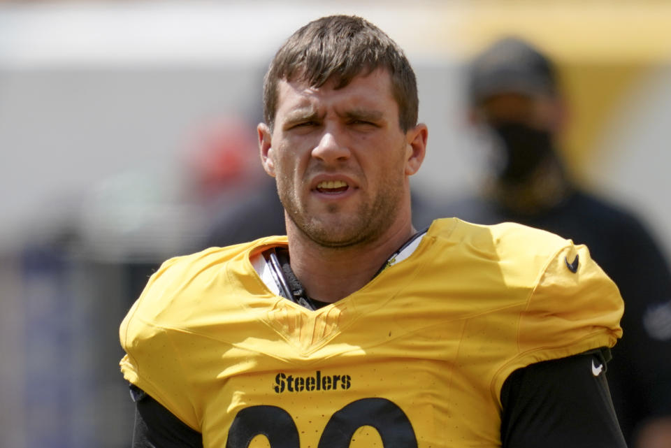 FILE - This Aug. 24, 2020 file photo shows Pittsburgh Steelers linebacker T.J. Watt (90) during an NFL football training camp practice in Pittsburgh. The three Watt brothers will share the field for the first time ever on Sunday, Sept. 27, when J.J. Watt and the Texans visit T.J., Derek and the Pittsburgh Steelers. (AP Photo/Keith Srakocic, File)