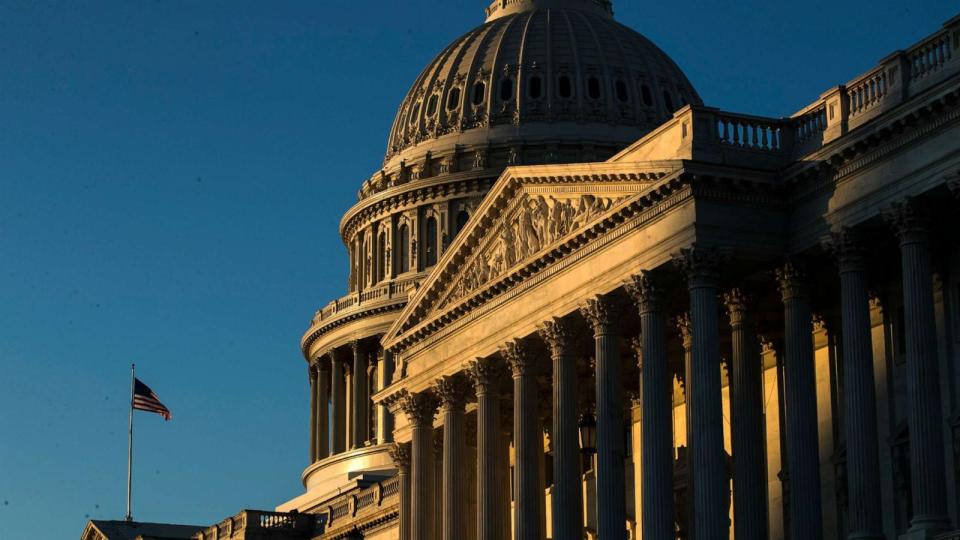 PHOTO: The U.S. Capitol building is illuminated by the rising sun, Dec. 18, 2019, on Capitol Hill in Washington. (Matt Rourke/AP)