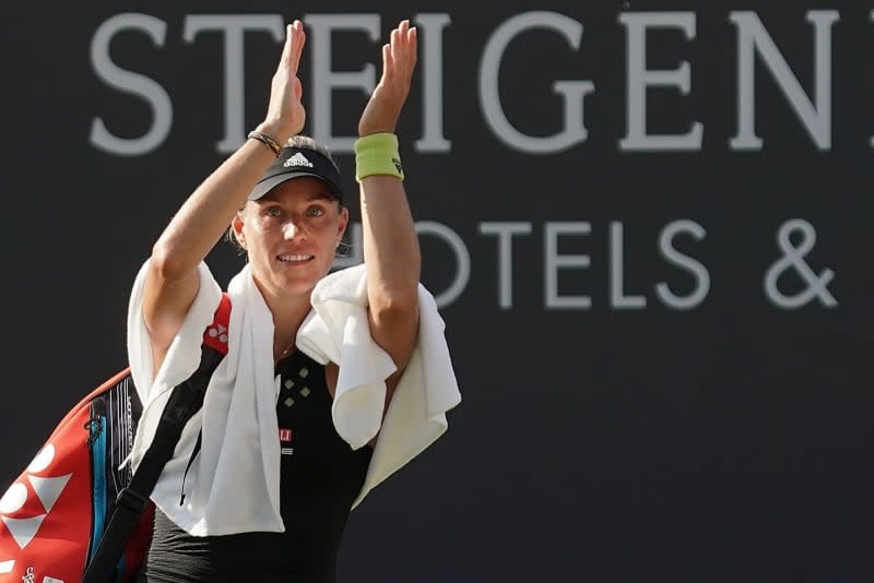 German tennis player Angelique Kerber thanks the spectators for their support after her women singles quarter final match against Alize Cornet in the WTA Tour. Former world number one Angelique Kerber said she's looking forward to her first Grand Slam tournament after making her comeback from maternity leave. Hasan Bratic/dpa