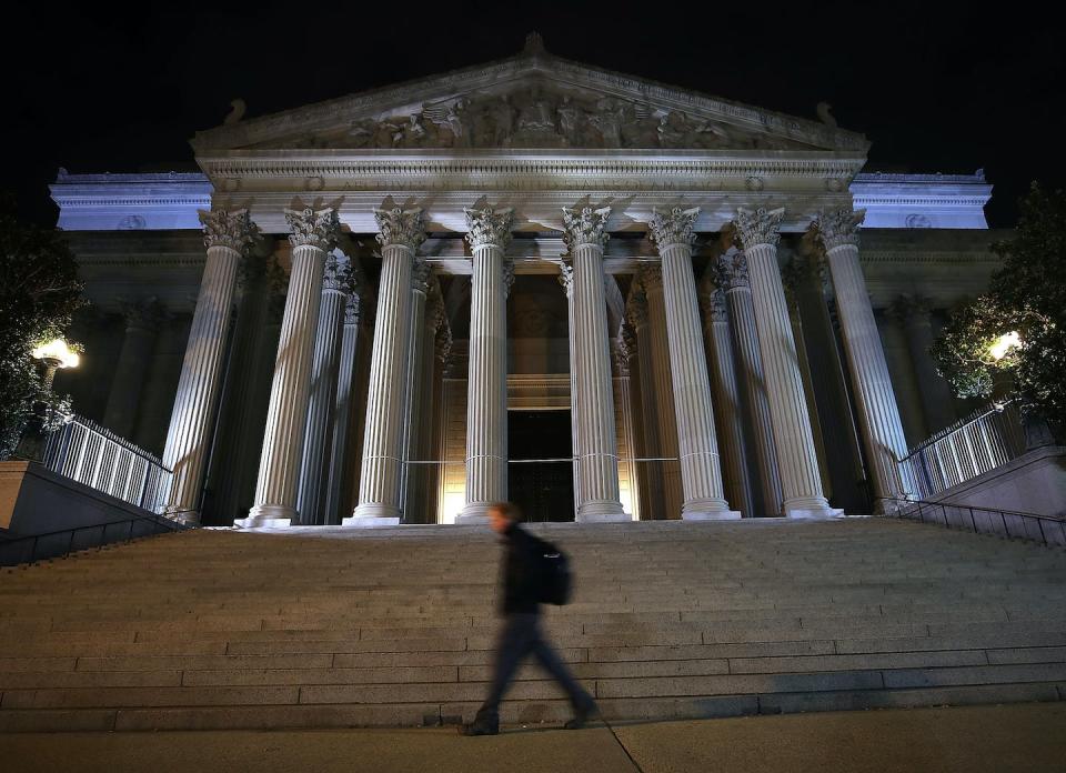The National Archives, pictured here, provides guidance to government agencies on document classification. <a href="https://www.gettyimages.com/detail/news-photo/man-walks-past-the-united-states-national-archives-building-news-photo/866602550?phrase=classified%20documents%20National%20Archives&adppopup=true" rel="nofollow noopener" target="_blank" data-ylk="slk:Mark Wilson/Getty Images North America;elm:context_link;itc:0;sec:content-canvas" class="link ">Mark Wilson/Getty Images North America</a>