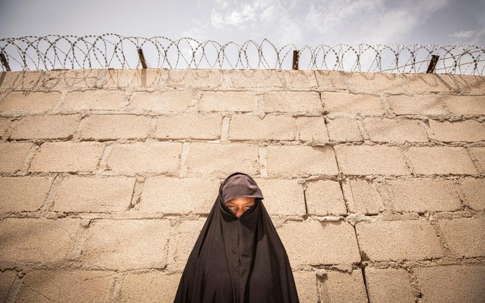 Aisha, 20, (not her real name) was abducted by Boko Haram when aged 16. She refused to marry so was instead forced to wear an explosive vest and told to detonate it at an army road block. However, she escaped when she surrendered instead of going through with it - Simon Townsley/The Telegraph