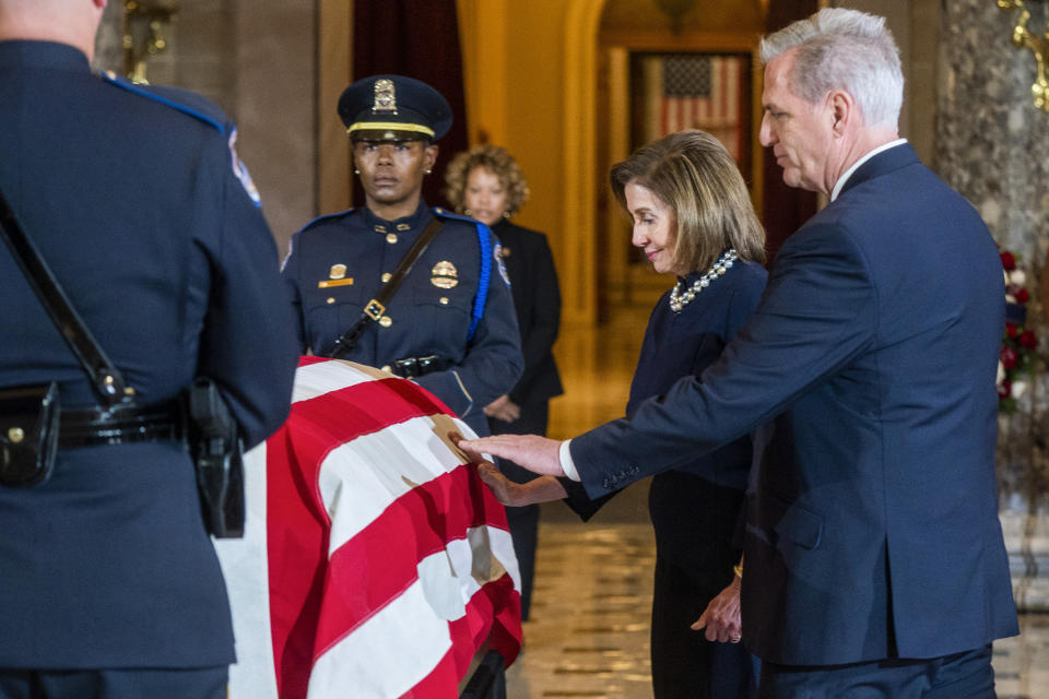 House Speaker Nancy Pelosi of Calif., and House Minority Leader Kevin McCarthy of Calif., pay respects to the late Rep. Don Young, R-Alaska, in Statuary Hall as he lies in state on Capitol Hill in Washington, Tuesday, March 29, 2022. Young, the longest-serving member of Alaska's congressional delegation, died Friday, March 18. He was 88. (Shawn Thew/Pool Photo via AP)