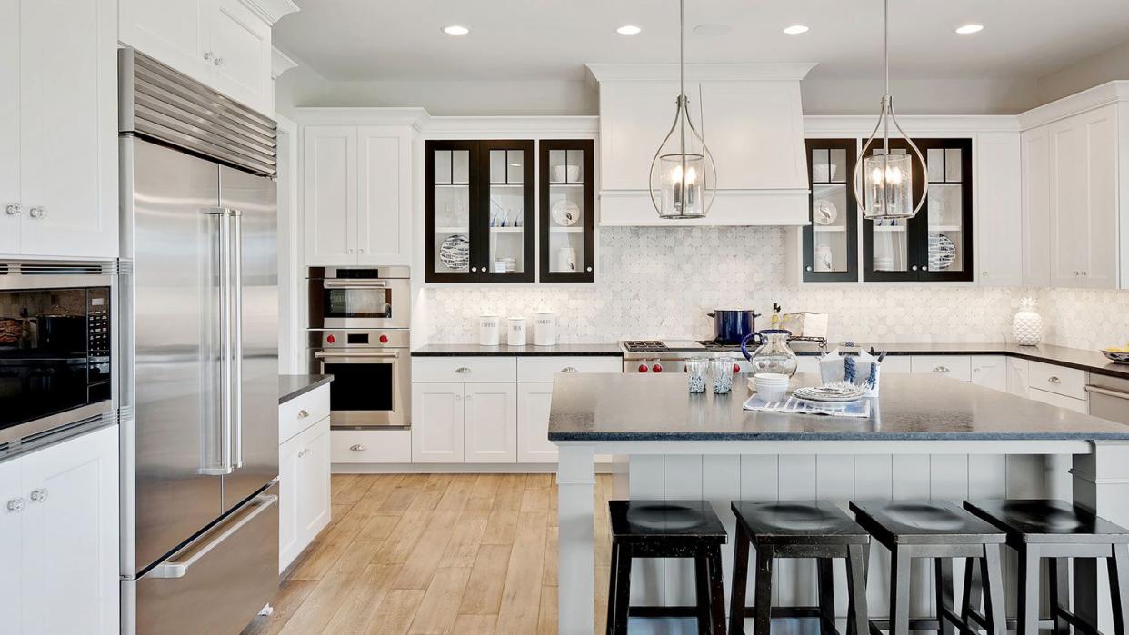 A modern, updated kitchen with stainless steel appliances