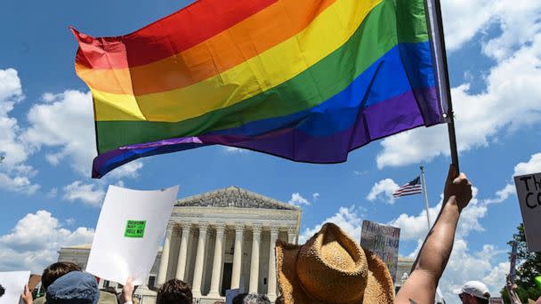 PHOTO: An abortion rights demonstrator waves a Pride flag during a rally in front of the US Supreme Court in Washington, DC, on June 25, 2022. (Roberto Schmidt/AFP via Getty Images)