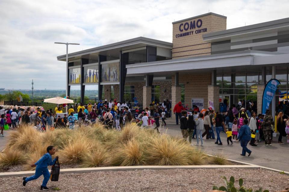 Children and families gather before the annual Easter egg hunt at the Como Community Center in Fort Worth on Saturday, April 8, 2023.
