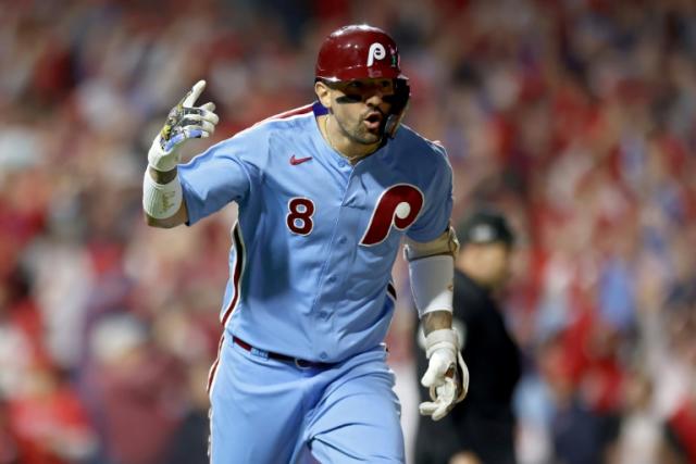 Castellanos hits 2 homers, powers Phillies past Braves and into