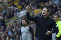 Chelsea's caretaker manager Frank Lampard gives instructions to his players during the English Premier League soccer match between Wolverhampton Wanderers and Chelsea, at the Molineux Stadium, in Wolverhampton, England, Saturday, April 8, 2023. (AP Photo/Rui Vieira)