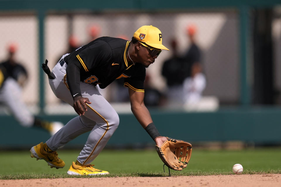 Pittsburgh Pirates second baseman Termarr Johnson fields a ground ball during the sixth inning of a spring training baseball game against the Detroit Tigers Saturday, March 9, 2024, in Lakeland, Fla. (AP Photo/Charlie Neibergall)