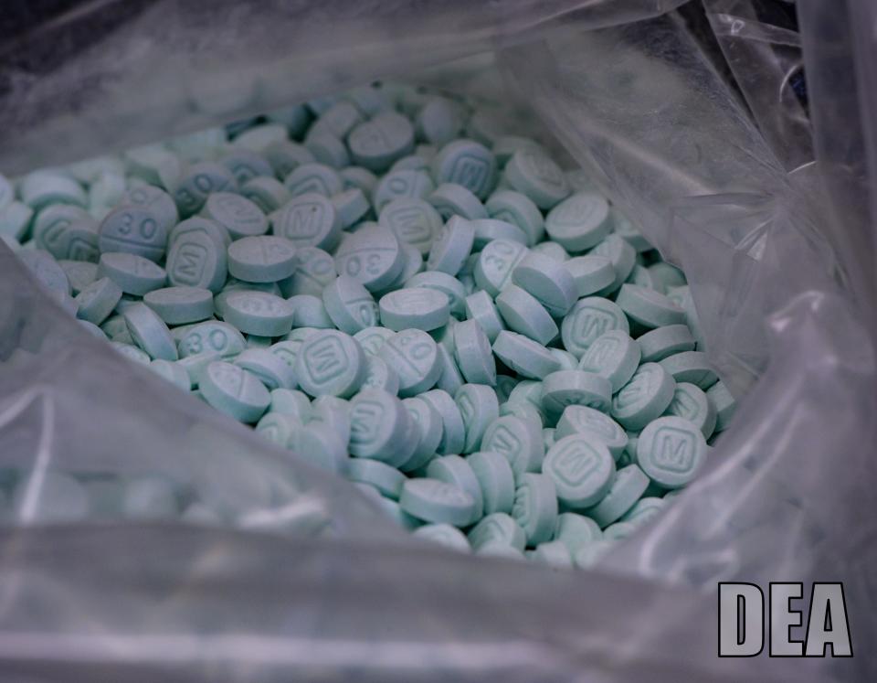 A U.S. Drug Enforcement Administration photo of a plastic bag containing hundreds of fentanyl-laced pills.