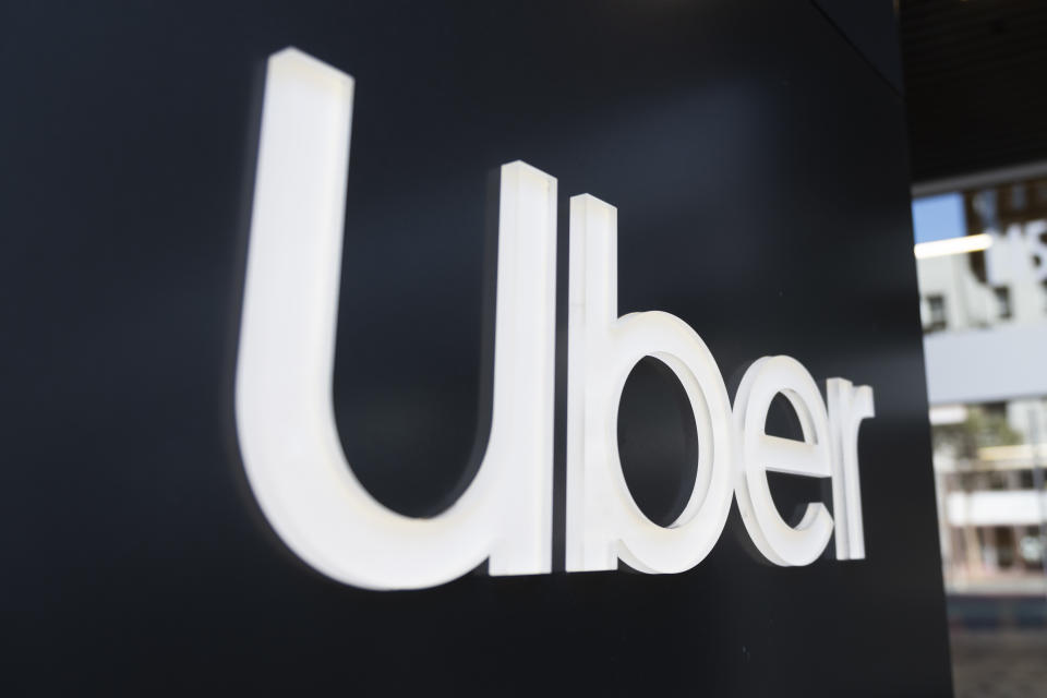 Uber logo is seen at its headquarters in San Francisco, California on October 15, 2019. The ridesharing company has laid off 350 employees on Monday, October 14, in an effort to cut cost. Shares of Uber climbed 3.2\% following the announcement. (Photo by Yichuan Cao/Sipa USA)