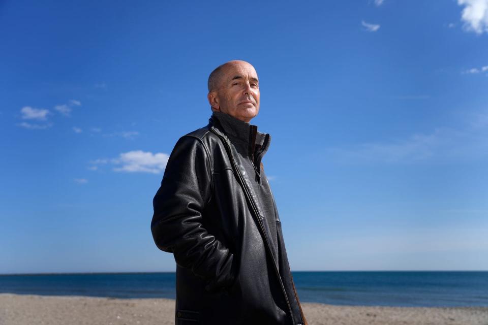 Bestselling author and Rhode Island native Don Winslow at East Matunuck State Beach, one of the settings fictionalized in his new book, "City on Fire," part one of a trilogy about warring crime families in Rhode Island.