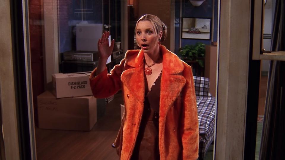 Phoebe’s Bright Orange Faux Fur Coat