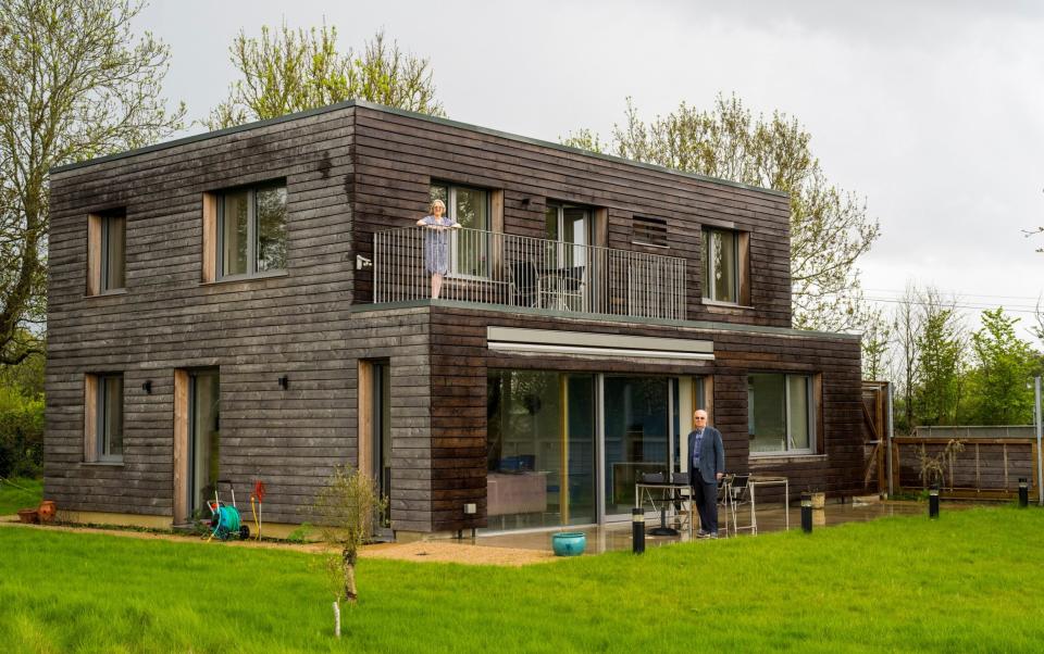 David and Linda Shall at their certified Passivhaus Plus home - Andrew Crowley