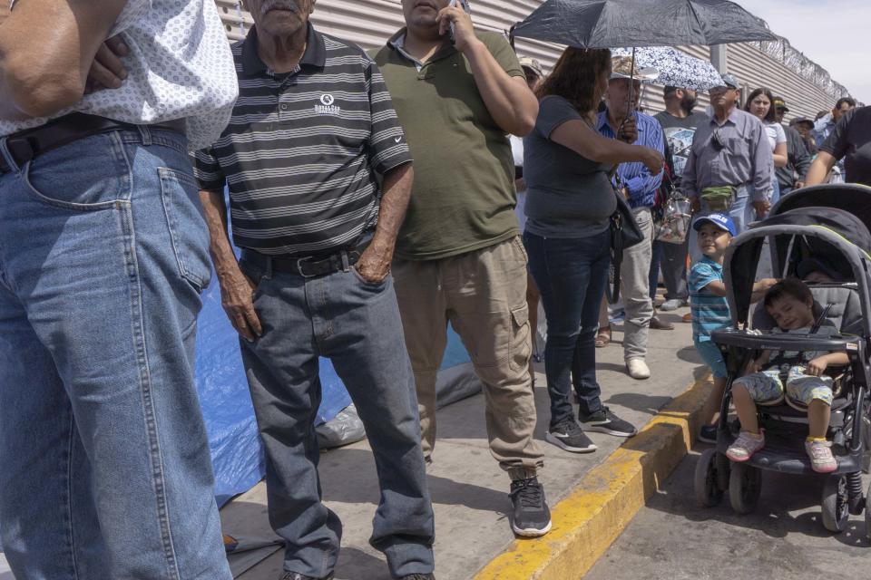 Asylum-seeking families with their children staying in tents housing waiting for their names to be called by Customs and Border Protection at the border in San Luis Rio Colorado, Mexico. Residents in the twin cities of San Luis, Arizona and San Luis Rio Colorado, Sonora remained a bit on edge over this potential scenario on Monday, although there were some more immediate concerns they had in the meantime.