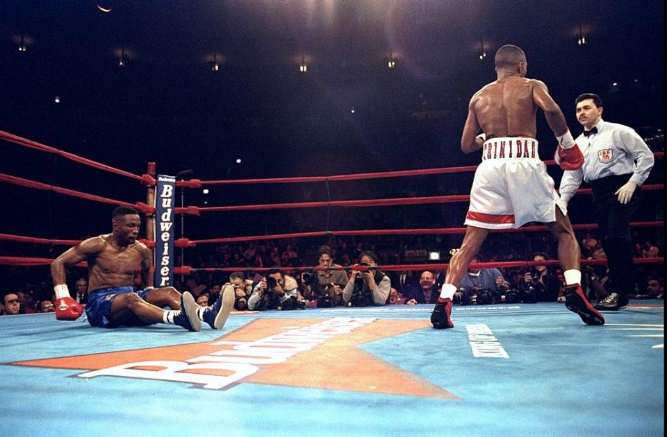 20 Feb 1999: Pernell Whitaker is knocked down in the second round during the fight against Felix Trinidad at Madison Square Garden in New York, New York. Trinidad won by a decision in the 12th round. Mandatory Credit: Al Bello /Allsport